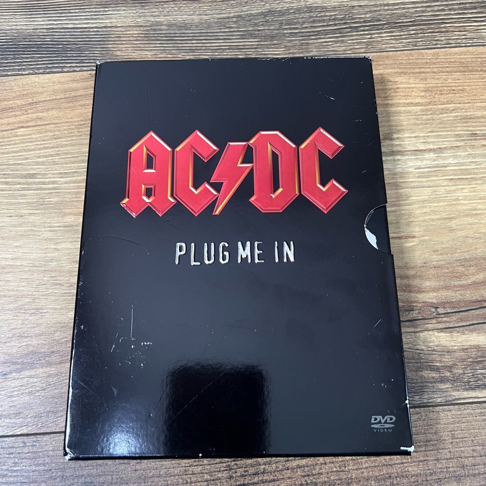 AC/DC Plug Me In DVD set approximately 5 hours‎ 1975-1979 1981-2003